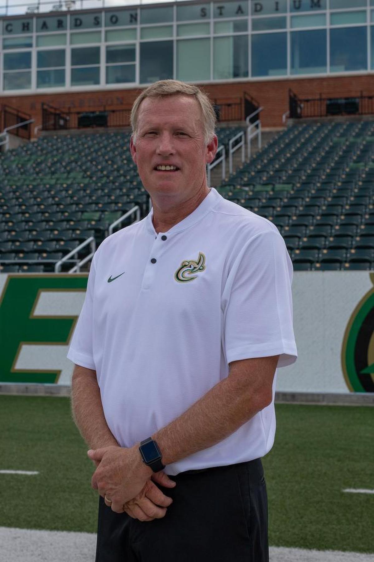 Charlotte’s Brad Lambert will coach his final game with the 49ers on Saturday, when they visit Florida Atlantic in Conference USA football.