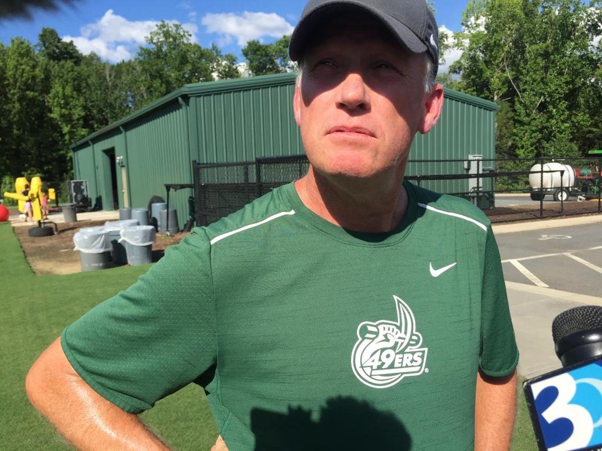 “We have lofty goals and our guys want to attain that,” Charlotte 49ers head football coach Brad Lambert, seen here at practice Saturday, says.