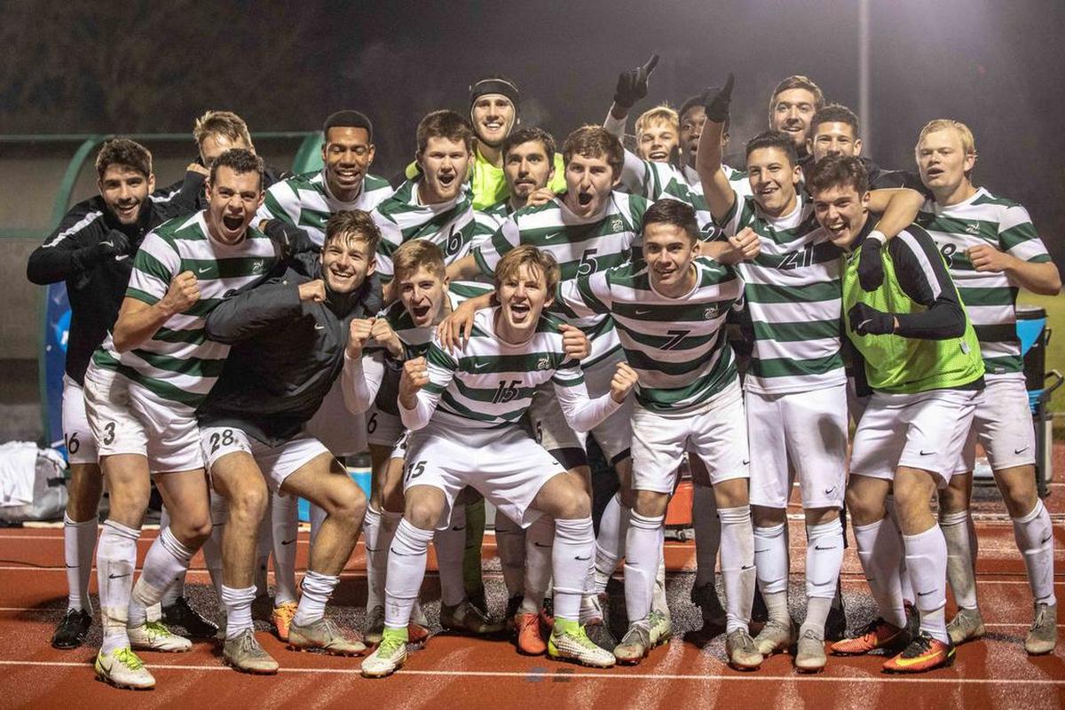 The Charlotte 49ers’ men’s soccer team celebrates after advancing in the NCAA soccer tournament, eliminating Georgia State on penalty kicks after a 2-2 tie.