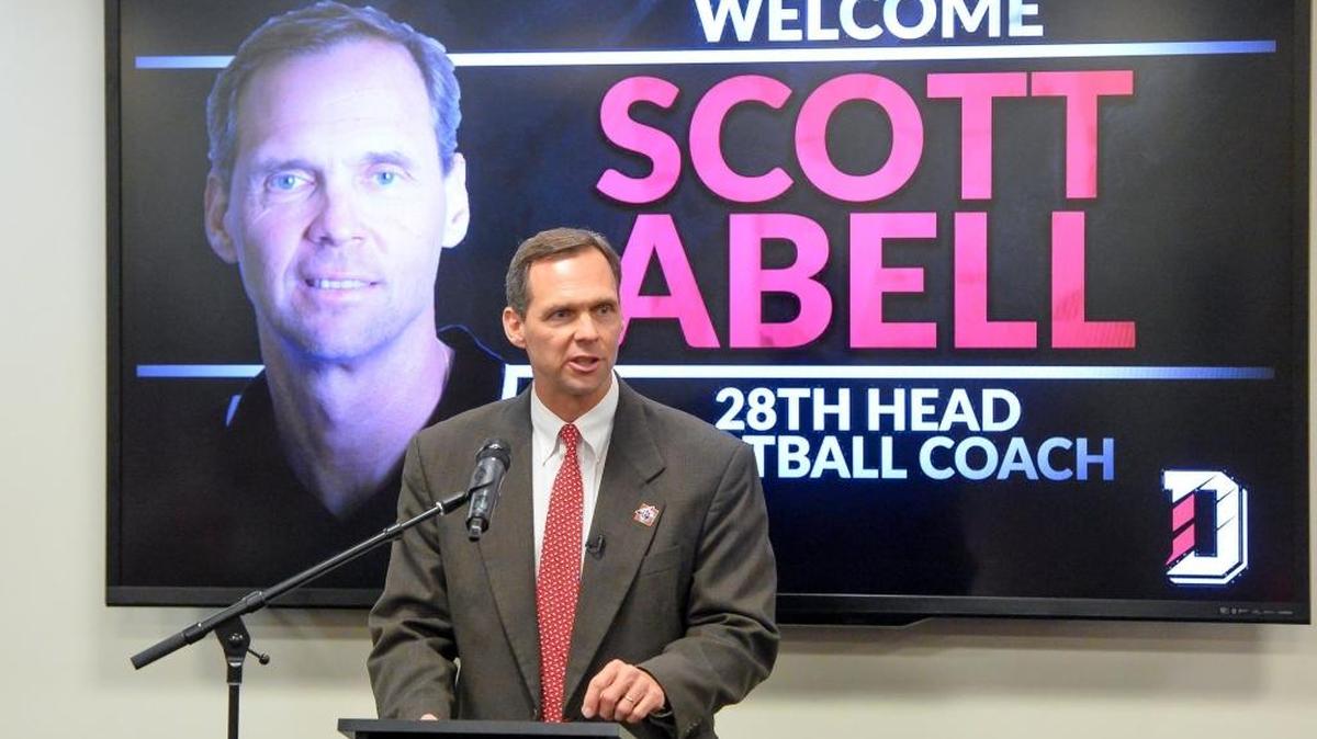 Scott Abell speaks to an audience at Davidson on Wednesday after he was introduced as the school’s 28th head football coach. He spent the past six seasons as Washington & Lee’s coach.