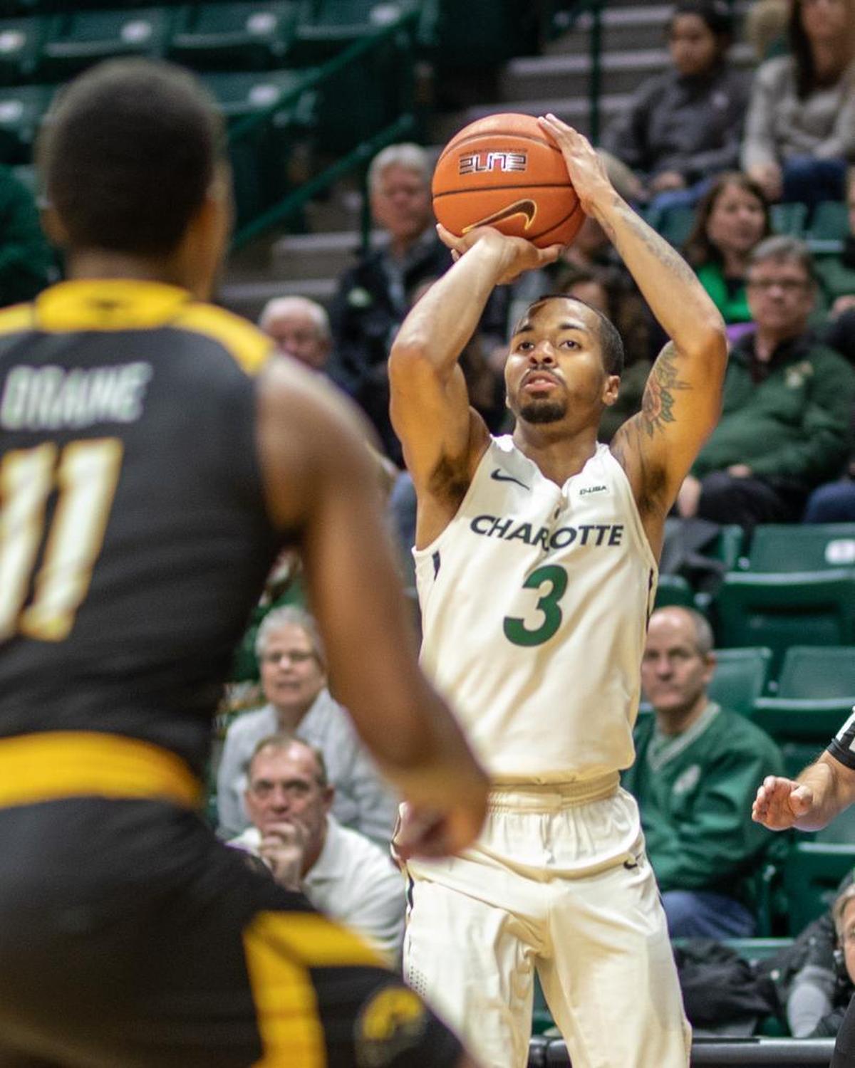 Charlotte 49ers senior guard Jon Davis pulled up for a jumper in the first half of Thursday night’s Conference USA men’s basketball game against visiting Southern Miss.