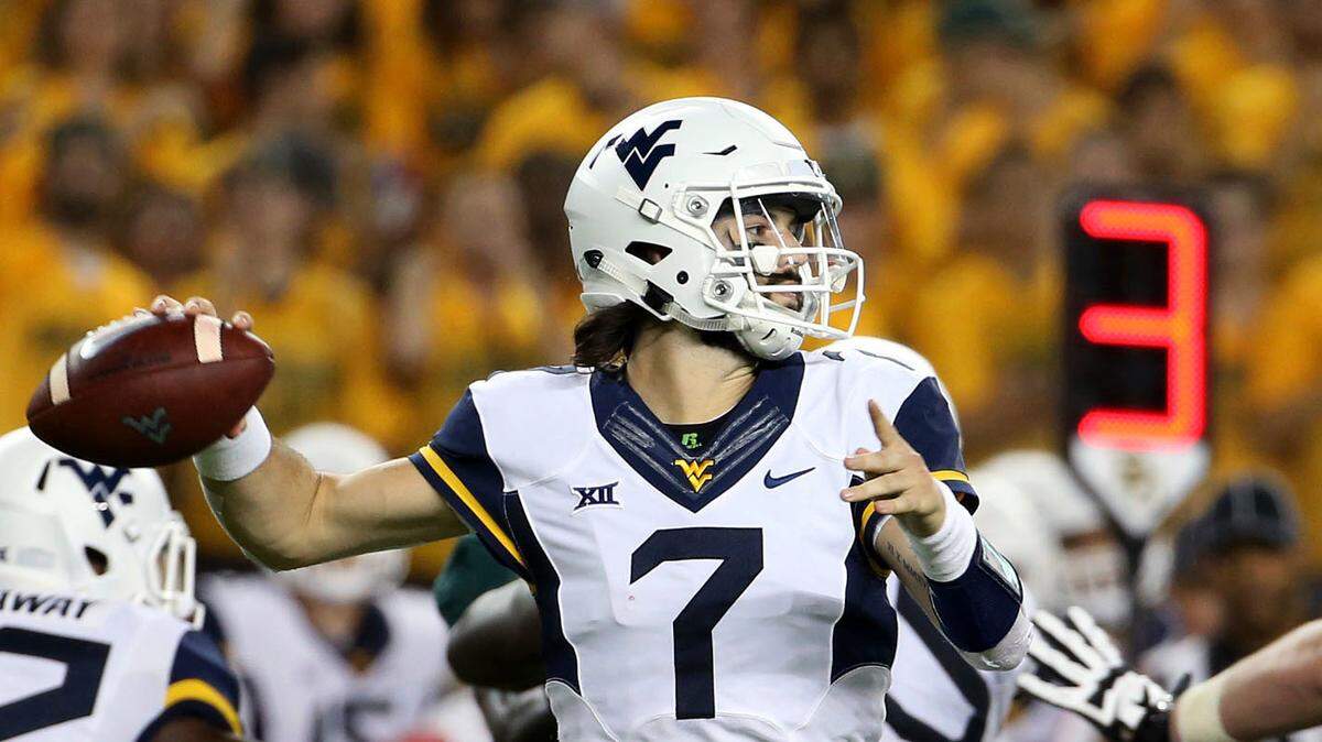 FILE - In this Oct. 21, 2017, file photo, West Virginia quarterback Will Grier (7) passes in the first half of an NCAA college football game against West Virginia, in Waco, Texas. While several Big 12 teams are unsettled on a starting quarterback, West Virginia gets back Will Grier after he broke the middle finger on his throwing hand late last season. (AP Photo/Jerry Larson, File)
