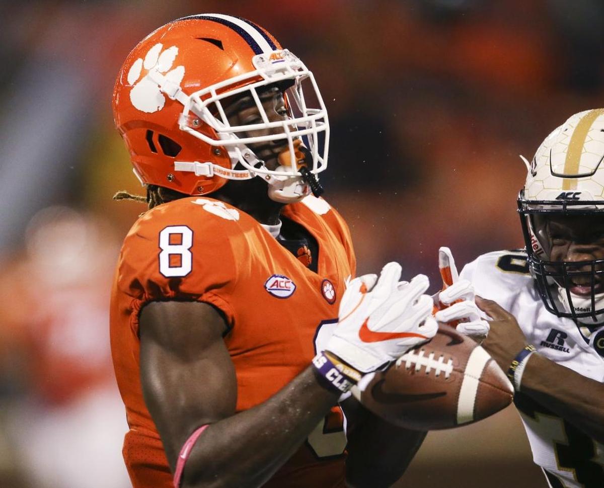 Clemson wide receiver Deon Cain, left, is the most likely Tiger to take the top off Alabama’s secondary.