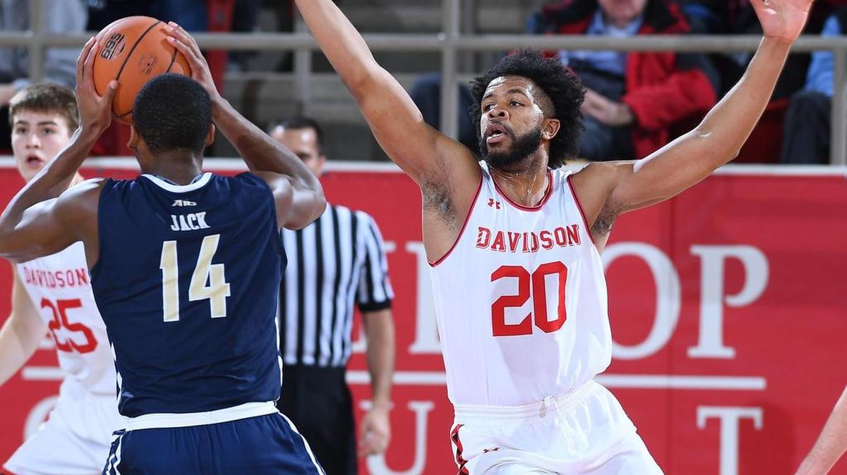 Davidson senior KiShawn Pritchett, right, defends against George Washington's Maceo Jack in the first half of Wednesday night’s Atlantic 10 men’s basketball game at Belk Arena. Pritchett scored a career-high 17 points in the Wildcats’ 73-62 victory.