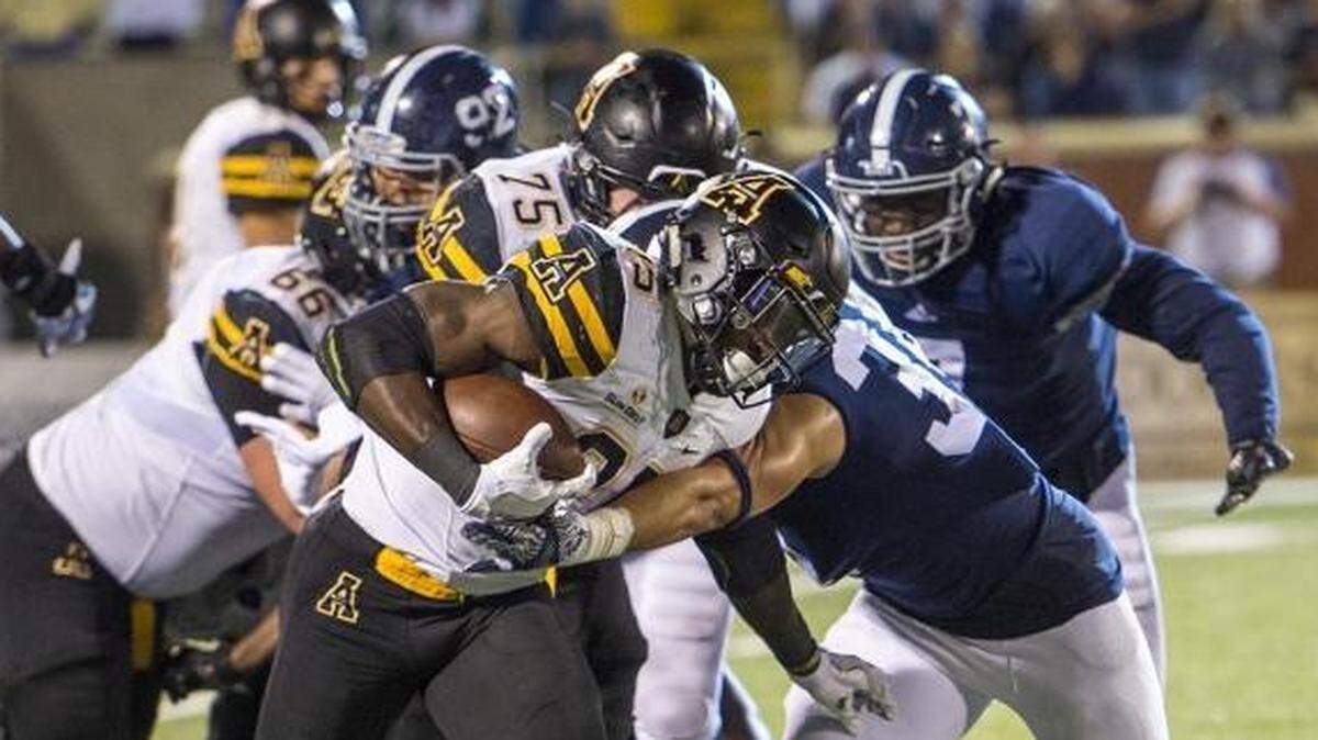 Appalachian State running back Jalin Moore (25, above in previous action) finished with 239 yards in Saturday’s win at Georgia State.