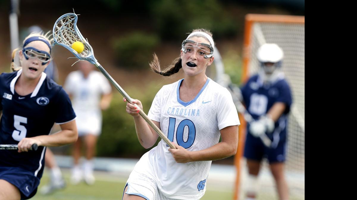 
North Carolina's Sydney Holman (10) controls the ball during the second half of UNC's 11-8 victory over Penn State in the NCAA women's college lacrosse quarterfinals at Fetzer Field in Chapel Hill.
