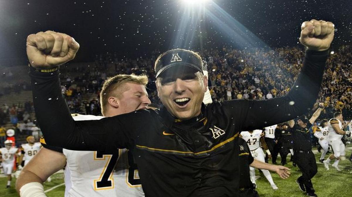 Appalachian State head coach Scott Satterfield celebrates after the Cramton Bowl NCAA college football game against Toledo in Montgomery, Ala., Saturday, Dec. 17, 2016. Appalachian State won 31-28. (Albert Cesare/The Montgomery Advertiser via AP)