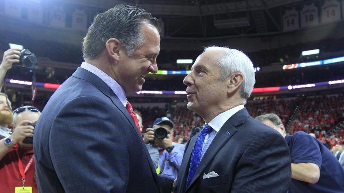N.C. State coach Mark Gottfried, left, says a 20-game ACC basketball schedule could be coming “pretty soon.” UNC head coach Roy Williams, right, doesn’t think a 20-game conference schedule would make a difference.