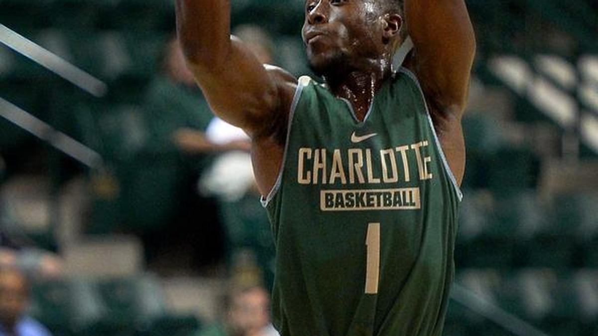 Charlotte 49ers guard Braxton Ogbueze releases a jump shot during the Green and White scrimmage at Halton Arena.
