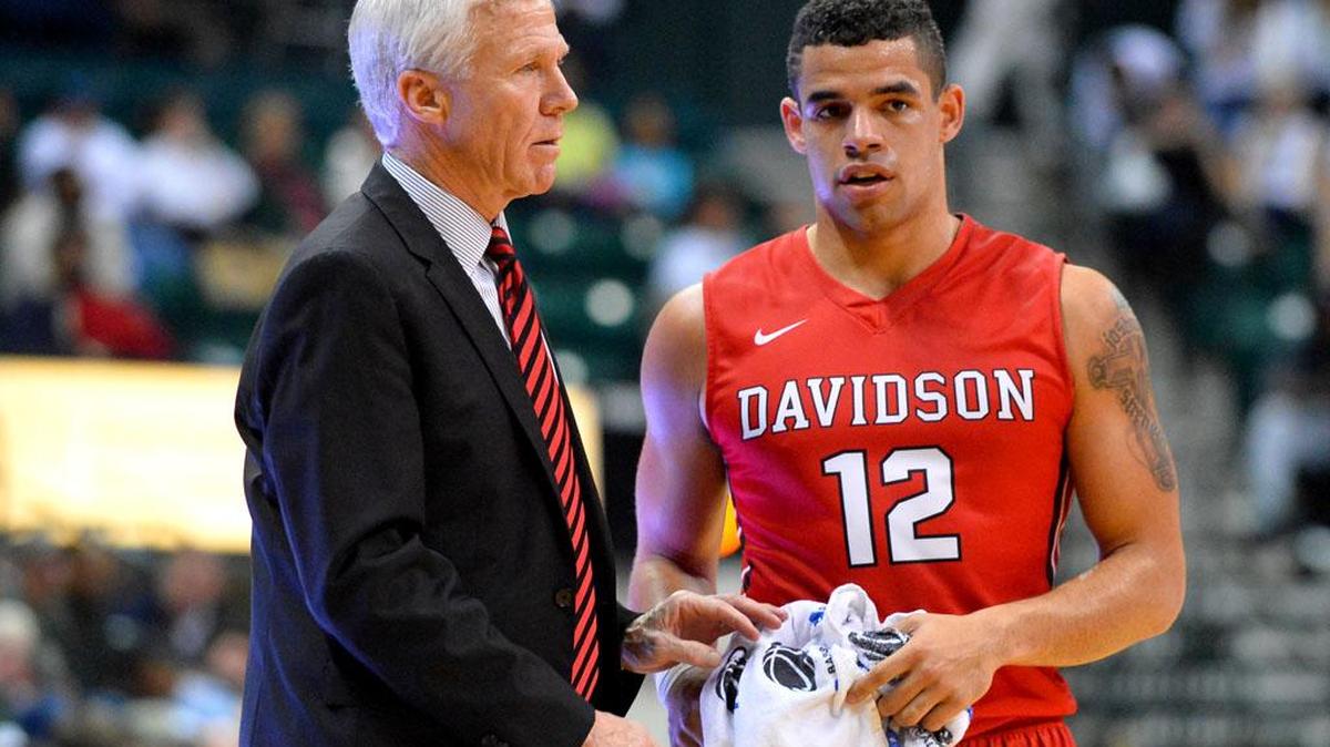 Davidson head coach Bob McKillop confers during the second half with junior point guard Jack Gibbs (12) during Tuesday’s game against the Charlotte 49ers at Halton Arena. Gibbs finished with a game- and career-high 41 points as Davidson won 109-74.
