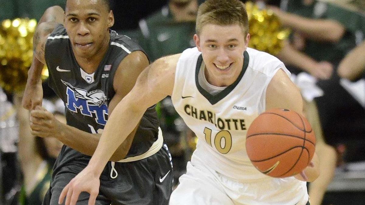 Charlotte 49ers guard Curran Scott, right in this file photo, scored 30 points in the 74-72 loss to UAB on Saturday night.