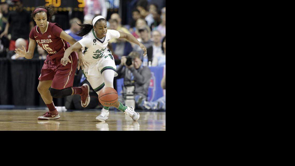 
Notre Dame’s Jewell Loyd and Florida State’s Maegan Conwright battle for the ball during the first half the ACC championship game Sunday at Greensboro Coliseum. Top-seeded Notre Dame beat second-seeded FSU 71-58, and Loyd led the way with 18 points.
