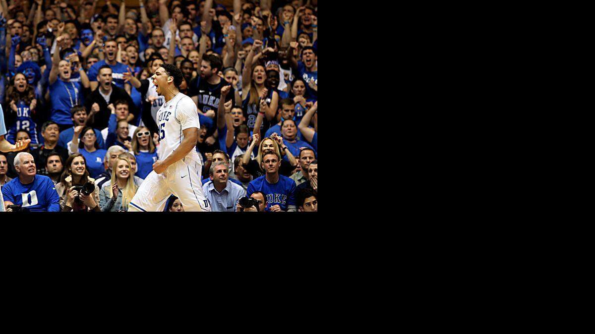 
Jahil Okafor celebrates after giving Duke a 62-61 lead again in the second half of play against UNC at Cameron Indoor Stadium in Durham, N.C. on Wednesday, February 18, 2015.
