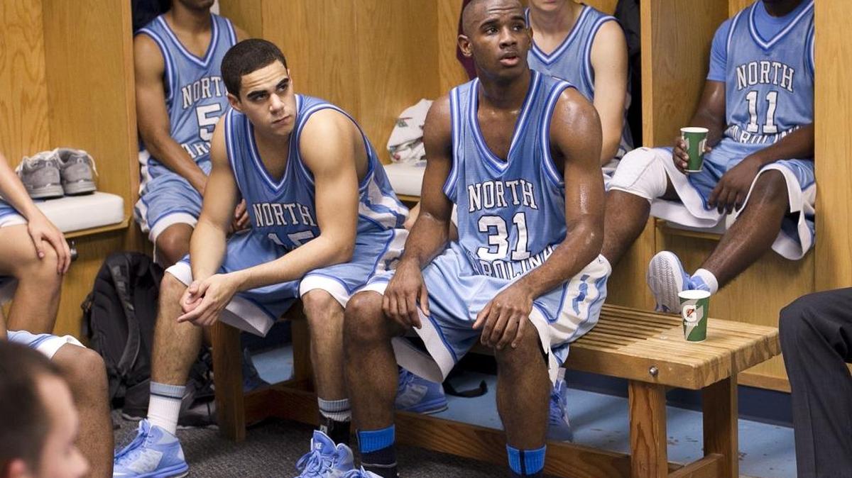 
Justin Coleman (31), a member of the North Carolina JV basketball team, listens to coach Hubert Davis in the locker room during halftime of their game against Mt. Olive at the Smith Center in Chapel Hill, N.C. on November 11, 2013.
