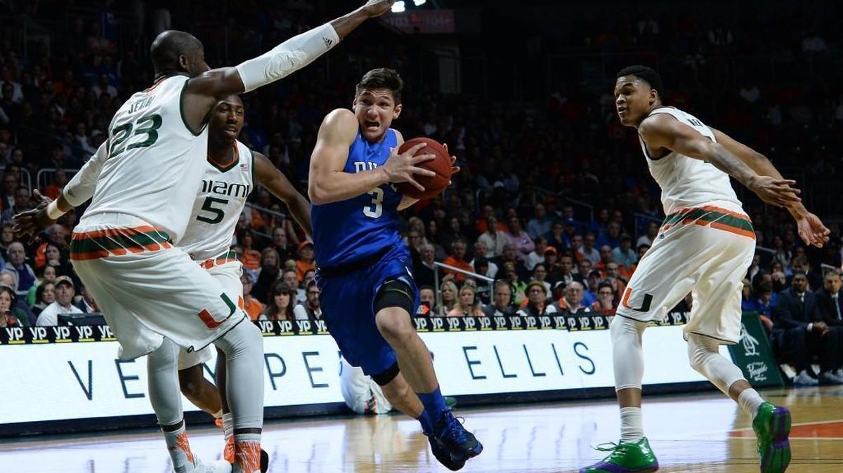 Duke’s Grayson Allen takes on the Miami defense during the first half at the BankUnited Center in Coral Gables, Fl.