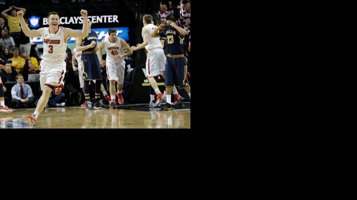 
Davidson guard Brian Sullivan (3) celebrates after the Wildcats’ 67-66 win over La Salle in the quarterfinals of the Atlantic 10 Conference tournament in New York, Friday, March 13, 2015. 
