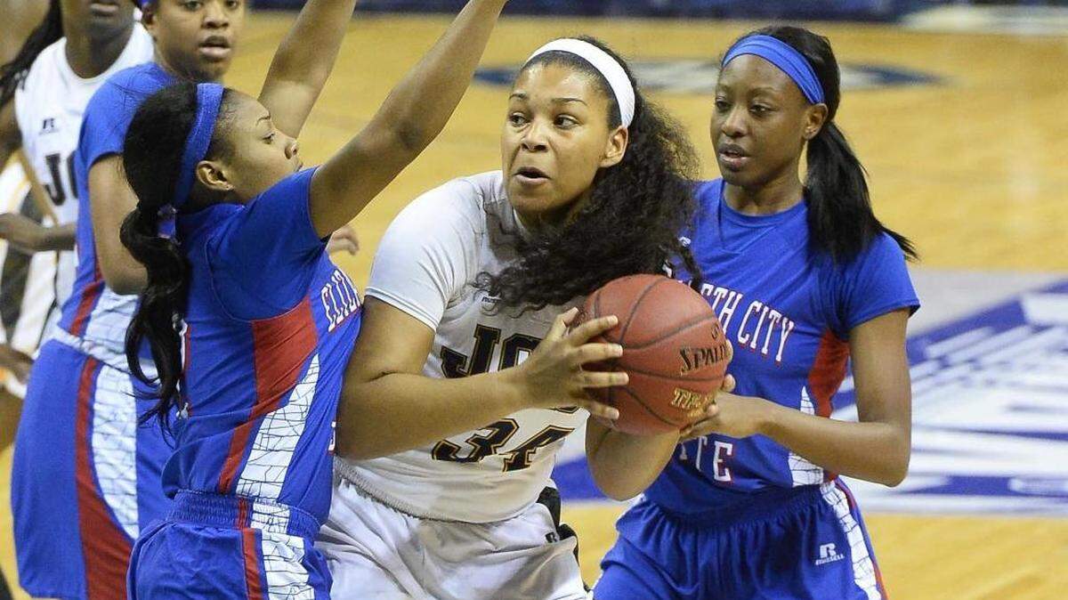 J.C. Smith’s Amena Brent, center, is surrounded by Elizabeth City State defenders during Tuesday’s first round of the CIAA women’s tournament at Time Warner Cable Arena. J.C. Smith won 70-50, advancing to Wednesday’s quarterfinals.
