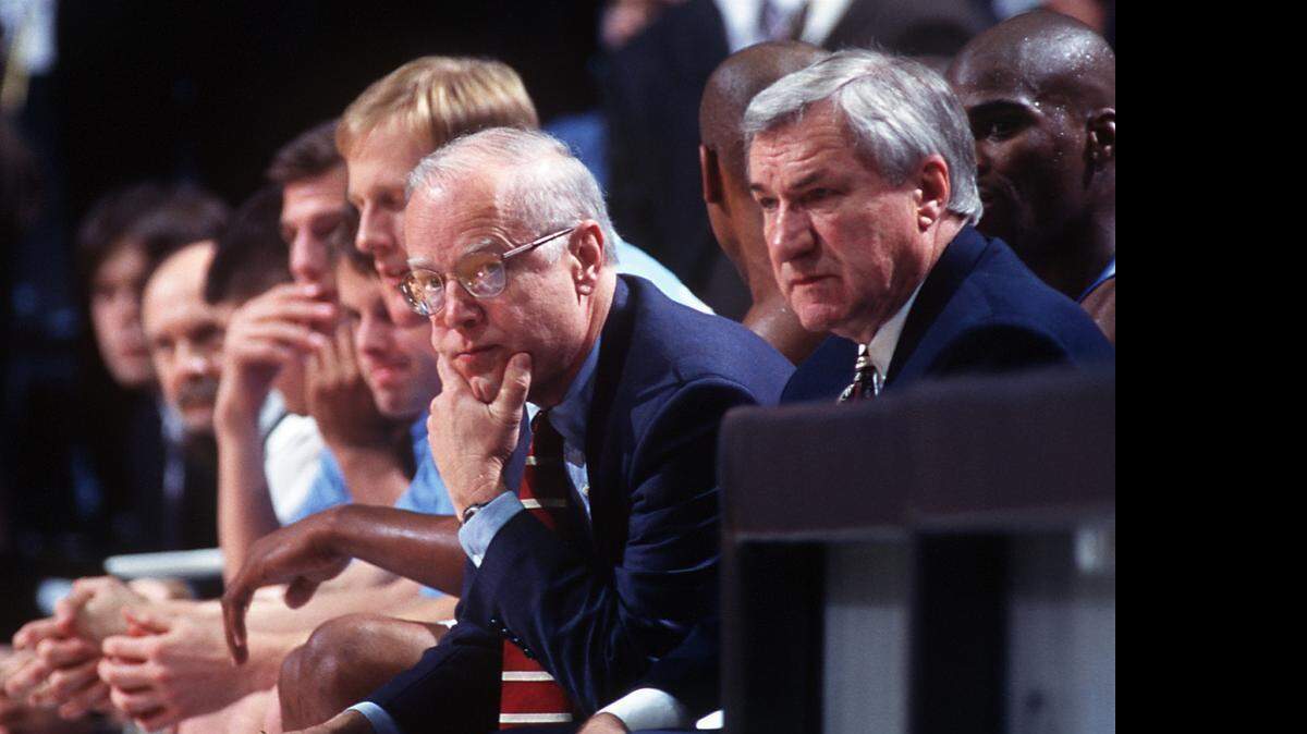 UNC assistant coach Bill Guthridge  with UNC coach Dean Smith in a 1997 game in the Smith Center in Chapel Hill, N.C.