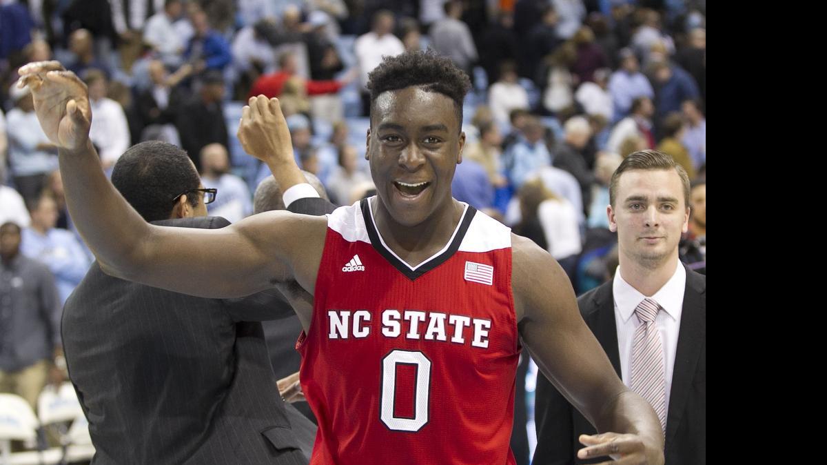 
N.C. State’s Abdul-Malik Abu (0) celebrates the Wolfpack’s 58-46 victory over North Carolina on Tuesday, Feb. 24, 2015 at the Smith Center in Chapel Hill.
