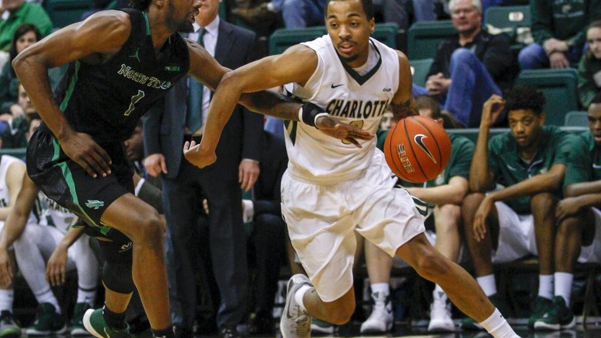 Charlotte guard Jon Davis, right, is the 25th player in 49ers’ basketball history to record 100 assists in a season. He has a team-leading 145 assists, the second highest single-season total by a Charlotte player. Davis joined teammate Andrien White on the Conference USA All-Freshman team.