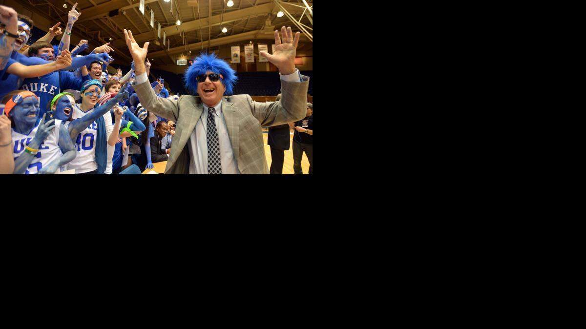 
Television personality Dick Vitale greets the Cameron Crazies prior to the start of the UNC game. Duke battled UNC at Cameron Indoor Stadium Saturday, March 8, 2014 in Durham, N.C.
