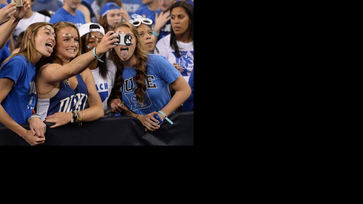 
Duke fans gets a selfie prior to the start of Saturday’s game against Michigan State. Duke will advance to Monday night’s NCAA national championship game after defeating Michigan State 81-61 at Lucas Oil Stadium in Indianapolis.
