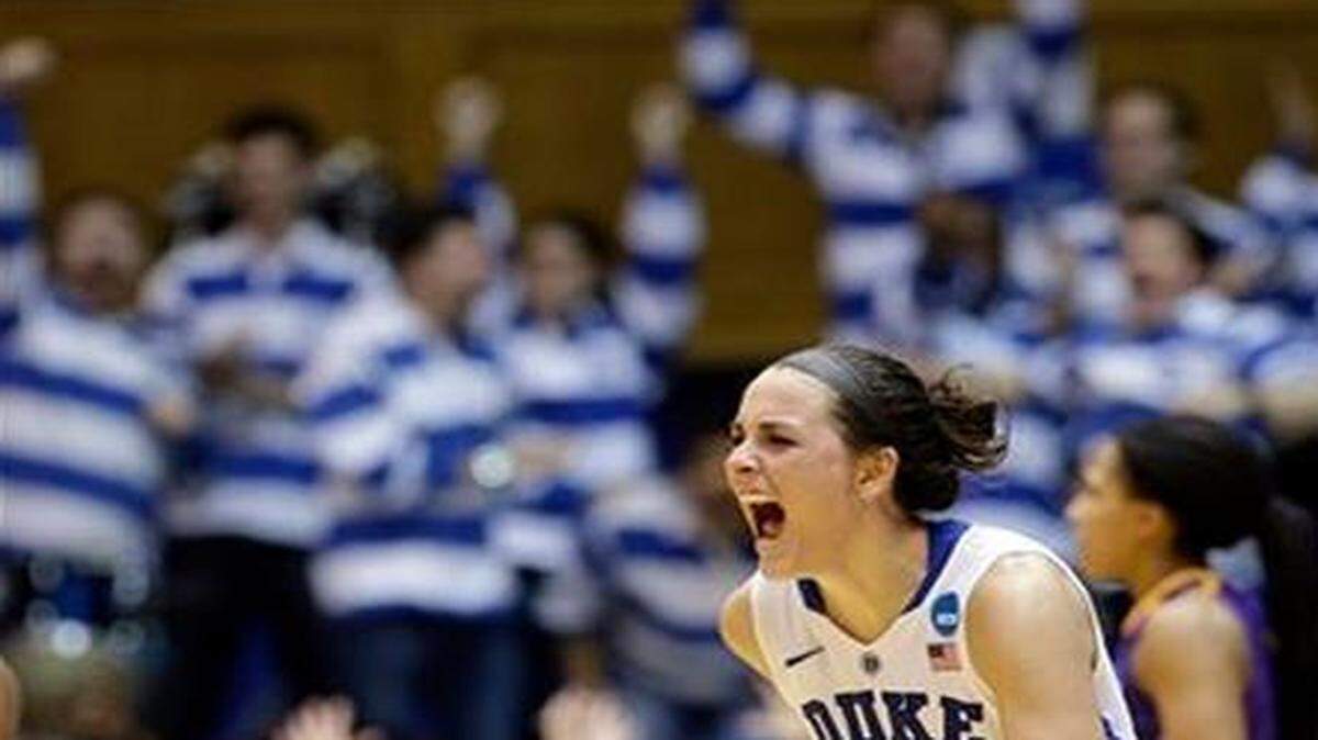 
Duke's Rebecca Greenwell shouts following her 3-point basket to take the lead against Albany late in the second half of a women's college basketball game in the first round of the NCAA tournament in Durham on Friday, March 20, 2015. Duke won 54-52.
