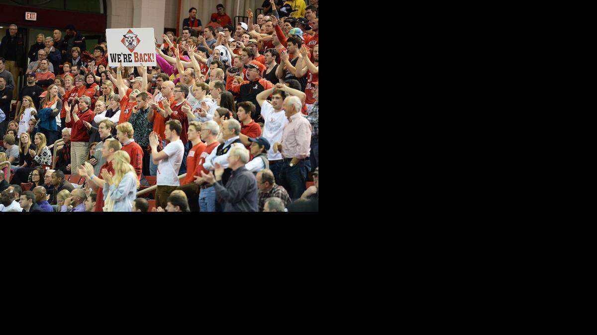 
The crowd celebrates Davidson's win over Virginia Commonwealth with a bold statement at Belk Arena: “We’re Back.” The Wildcats won Thursday night to remain tied for first place in the league with Dayton. If Davidson wins Saturday at Duquesne, the Wildcats would clinch the Atlantic 10 regular-season title in their first season in the league. 
