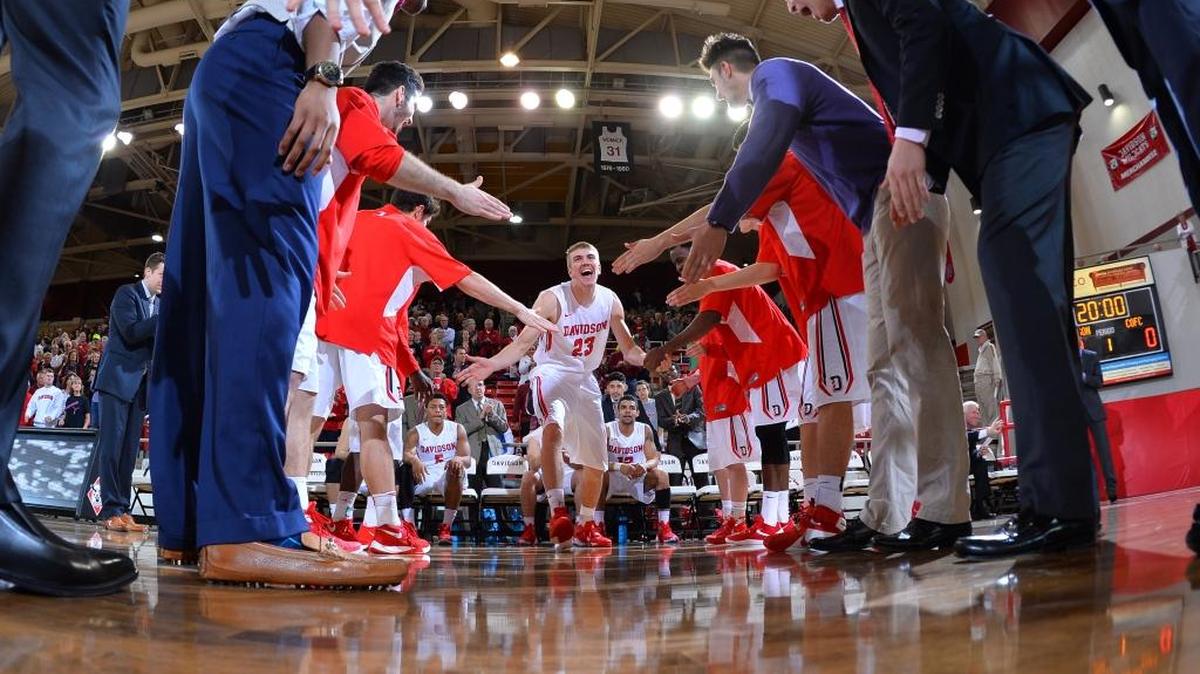 Davidson's Peyton Aldridge (23) fires his team up as he introduced before Saturday’s game at John M. Belk Arena. Aldridge led the Wildcats with 21 points, including the game winner, as Davidson beats Charleston 82-81.