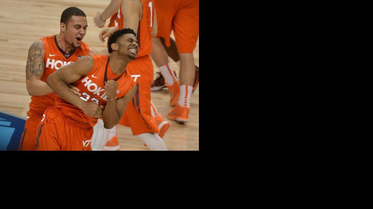 
Virginia Tech's Malik Muller hugs teammate Jalen Hudson as time runs out and Virginia Tech beats Wake Forest 81-80 during the second game of the ACC Tournament at the Greensboro Coliseum on March 10, 2015. Hudson scored 32 points in the win.
