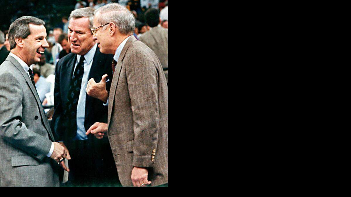 
Kansas coach Roy Williams, left, Dean Smith, Bill Guthridge, and Matt Doherty chat with each other just before UNC beat Kansas in the 1993 Final Four semi-final game in New Orleans. All four men have coached the Tar Heels; Guthridge replaced Smith when he retired in 1997, Doherty replaced Guthridge on his retirement in 2000, and Williams replaced Doherty after he was fired in 2003.
