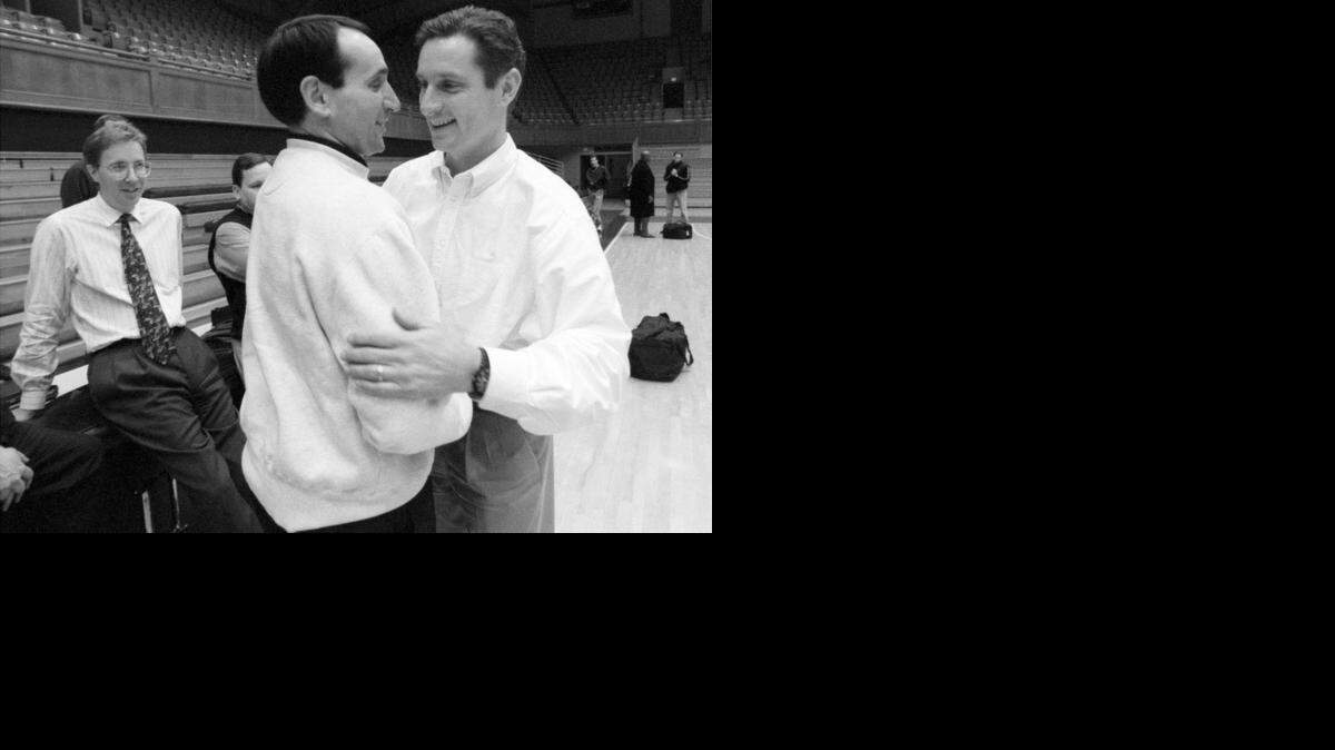 
Duke head coach Mike Krzyzewski with former player and University of Washington head coach Bob Bender inside Cameron Indoor Stadium in 1998. Bender brought his team to Cameron Indoor to practice for before an NCAA tournament being played in Greensboro.
