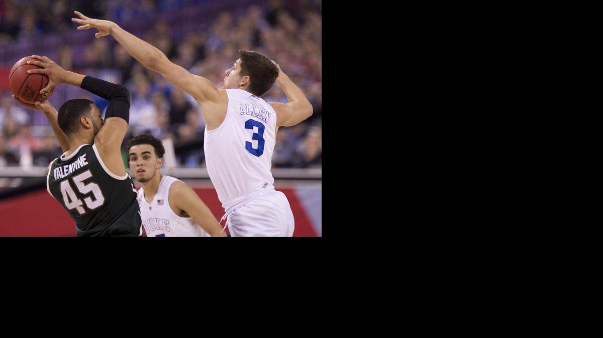 
Duke’s Grayson Allen (3) defends Michigan State’s Denzel Valentine(45) in the first half during the NCAA semifinals onat the Lucas Oil Stadium in Indianapolis.
