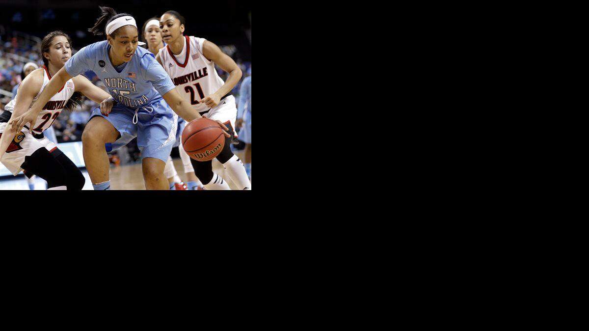 North Carolina's Allisha Gray (15) is closely guarded by Louisville's Bria Smith (21) and Jude Schimmel (22) during the first half of an NCAA college basketball game in the quarterfinals of the Atlantic Coast Conference women's tournament in Greensboro, N.C., Friday, March 6, 2015.