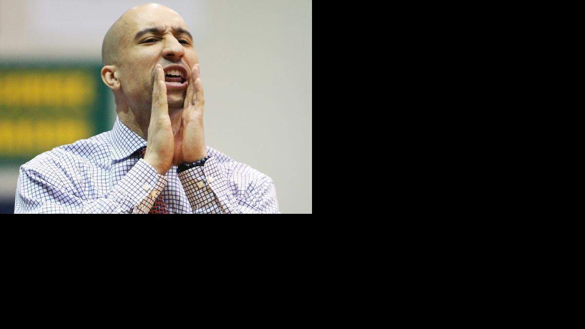 
VCU head coach Shaka Smart yells from the sidelines as his team plays St. Bonaventure, Feb. 7, 2015.
