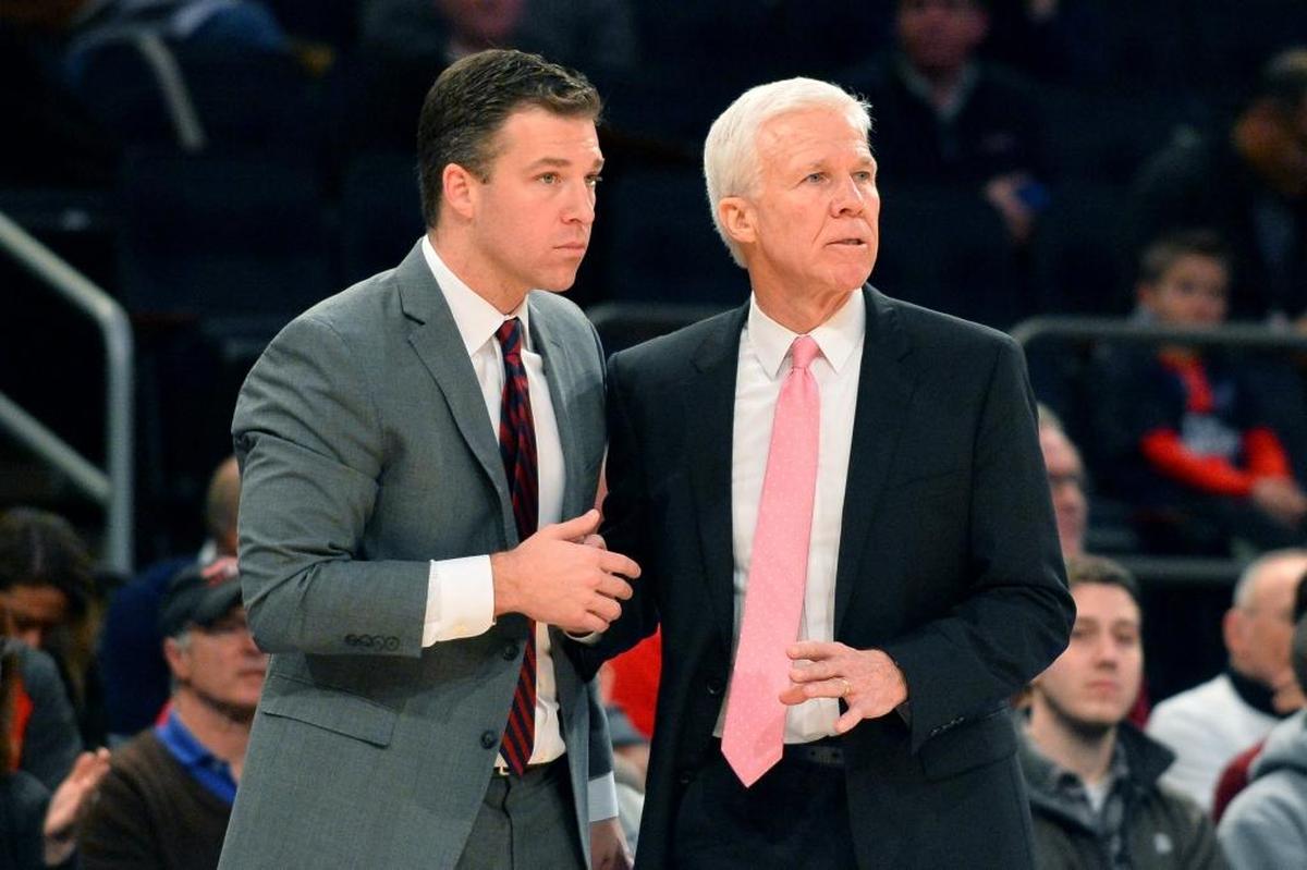 Matt McKillop (left) was on his father Bob’s staff since 2008 at Davidson and now will replace him as head coach.