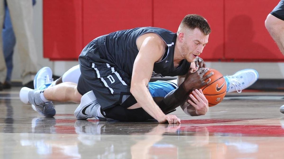 Davidson guard Brian Sullivan, top, scored 20 points in Saturday’s loss at Fordham.