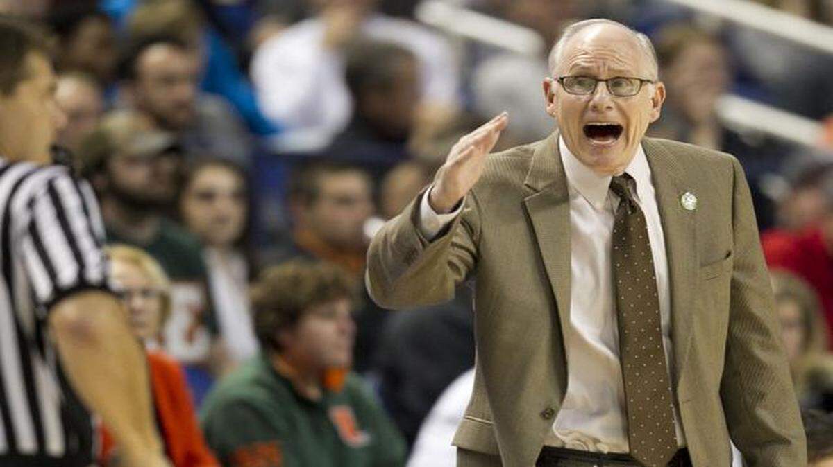 
Miami head coach Jim Larranaga argues a call with an official during the first half against Virginia Tech during the second round of the Atlantic Coast Conference Tournament at the Greensboro Coliseum in Greensboro, N.C., on Wednesday, March 11, 2015. Miami advanced, 59-49. 
