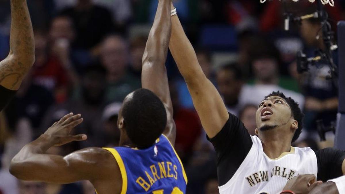 
Will former UNC player Harrison Barnes (left) and former Kentucky player Anthony Davis play in a charity game between Tar Heel/Wildcat alumni?
