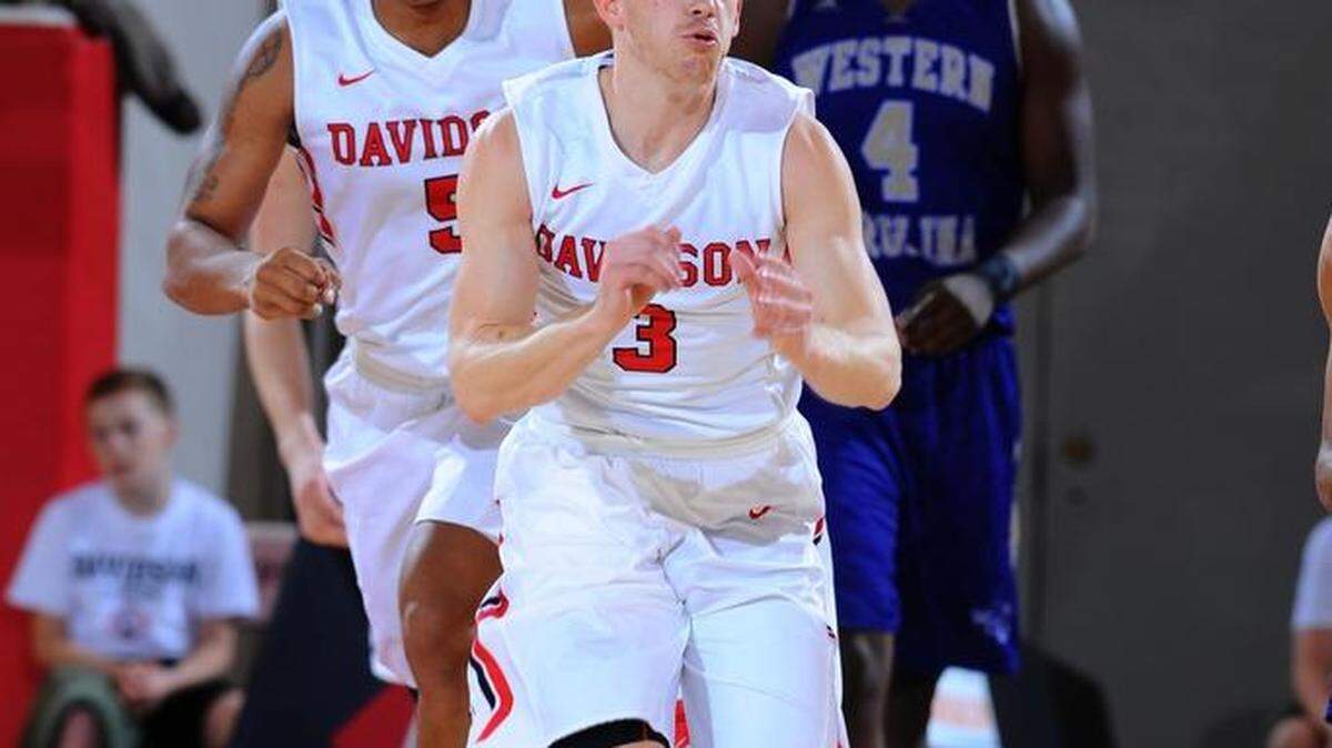 Davidson’s Brian Sullivan chases down a loose ball in Saturday’s Gotham Classic game against Western Carolina at John M. Belk Arena. Sullivan scored a game-high 20 points as Davidson won 87-54.