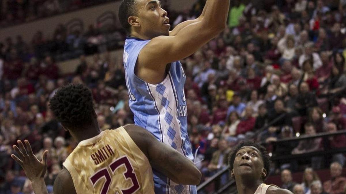 North Carolina’s Brice Johnson (11) puts up a shot between Florida State’s Terance Mann (14) and Robbie Berwik (24) during the second half on Monday, January 4, 2016 at the Tucker Center in Tallahassee, Fla.