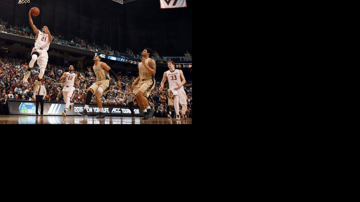 
Boston College guard Olivier Hanlan goes in to score two of his game-high 25 points as the Georgia Tech defense trails the play. Boston College beat Georgia Tech 66-65 during the opening game of the ACC tournament at the Greensboro Coliseum on Tuesday.
