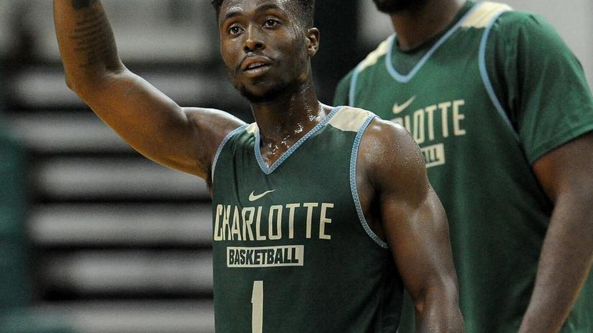 Junior guard Braxton Ogbueze (1) and senior center Joseph Uchebo are the Charlotte 49ers’ most experienced players.