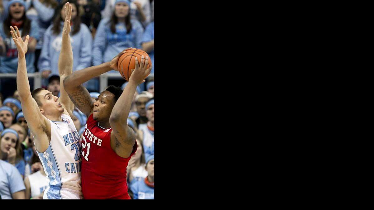 
North Carolina’s Jackson Simmons played two minutes against BeeJay Anya and N.C. State on Feb. 24. 
