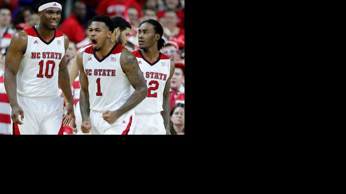 
Three of the ACC’s top scorers – N.C. State’s Trevor Lacey, above center, formerly at Alabama; Boston College’s Aaron Brown (Southern Mississippi); and Miami’s Sheldon McClellan (Texas) – are transfers in their initial season of league competition. Lacey and Ralston Turner, an LSU transfer, are N.C. State’s top two scorers. 



