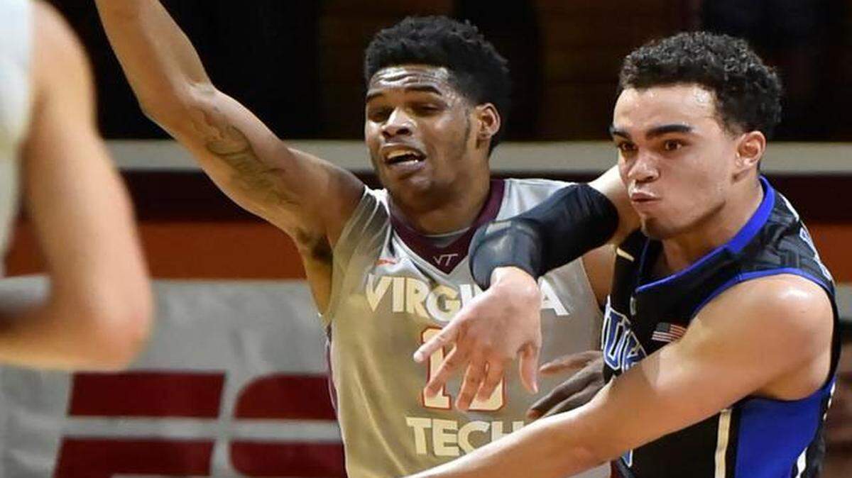 
Duke’s Tytus Jones steals a pass from Virginia Tech’s Ahmed Hill during the second half Wednesday in Blacksburg, Va. 
