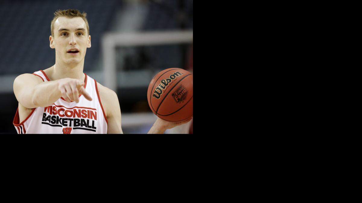 
Wisconsin forward Sam Dekker participates in a drill during practice for an NCAA Final Four tournament college basketball semifinal game Friday, April 4, 2014, in Dallas. Wisconsin plays Kentucky on Saturday, April 5, 2014. 
