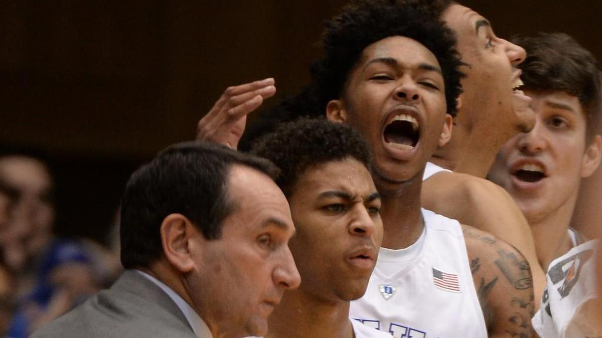 Duke head coach Mike Krzyzewski, guard Derryck Thornton (12), guard Brandon Ingram (14) and forward Chase Jeter (2) react after a Duke basket in the first half at Cameron Indoor Stadium in December.