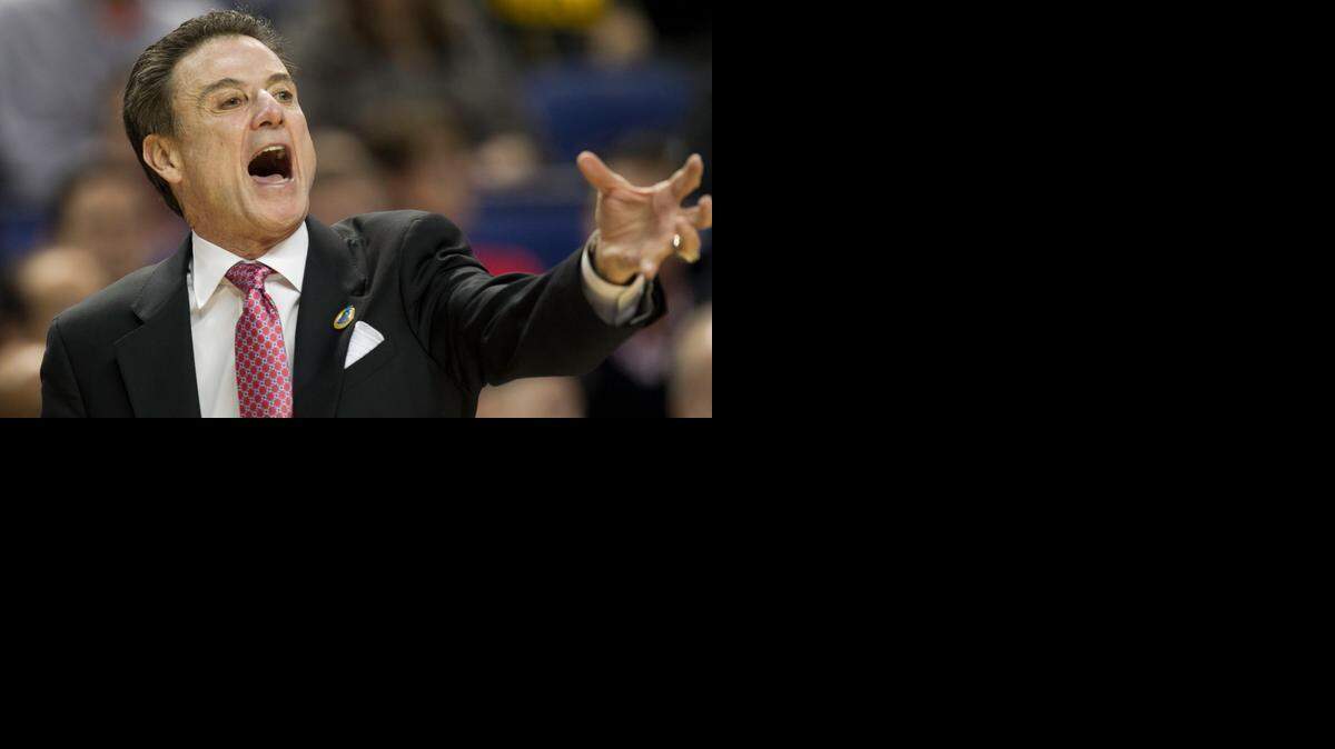 
Louisville coach Rick Pitino directs his team against North Carolina on Thursday, March 12, 2015, during the quarterfinals of the Atlantic Coast Conference Basketball Tournament at the Greensboro Coliseum in Greensboro. NC State faces Louisville on Friday with an NCAA Elite Eight berth on the line. 
