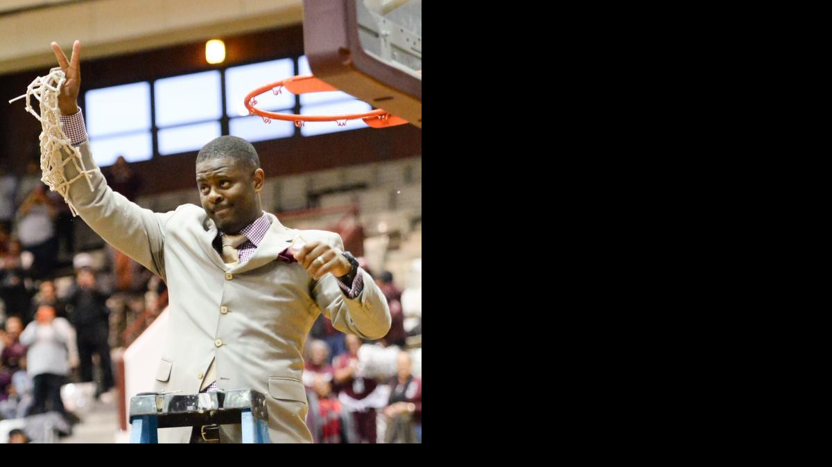 
N.C. Central coach LeVelle Moton cuts down the net after the Eagles clinched the MEAC regular-season title on Feb. 28. Moton assured fans Sunday that the team would treat the NIT like it was the NCAA tournament. “We really found out that the things that make you feel good in life, championships and love, are the same thing that can make you feel so bad as well,” Moton said. “But the true test of a man, is how he gets back up.”
